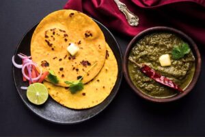 Read more about the article The Ritual Taste of Punjab: Sarson Da Saag and Makki Di Roti
